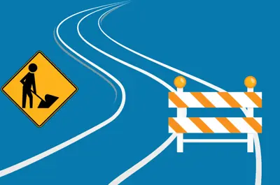 Construction icons and the outline of a curving road against a blue background